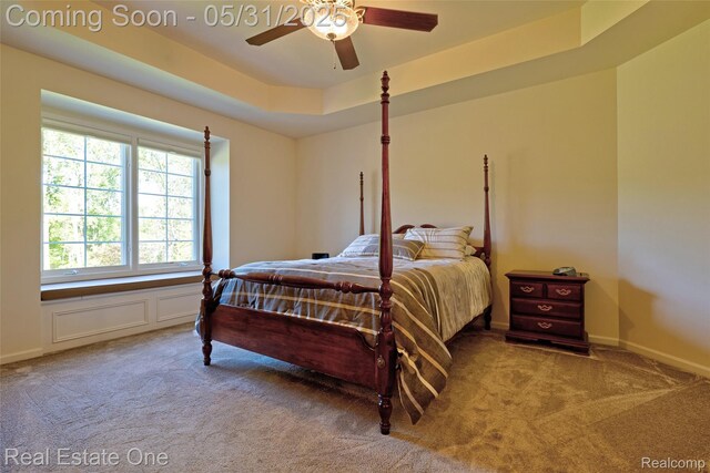 1572 S Hadley Rd, Ortonville, MI 48462 - bedroom with light carpet, a ceiling fan, and baseboards
