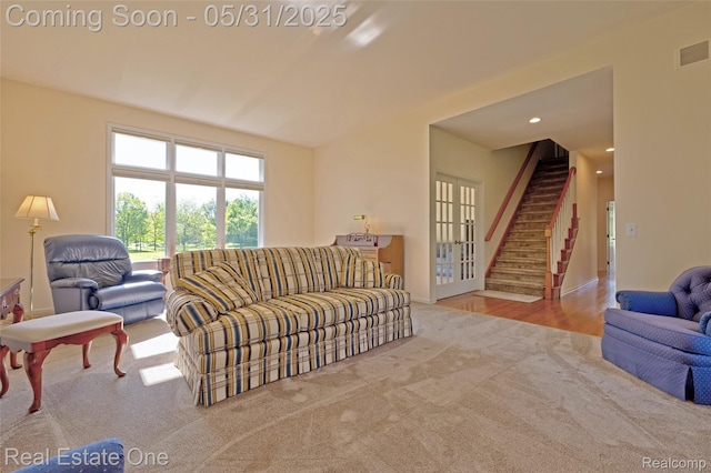 1572 S Hadley Rd, Ortonville, MI 48462 - carpeted living area with stairway, recessed lighting, and baseboards