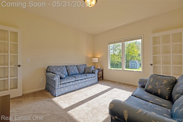 1572 S Hadley Rd, Ortonville, MI 48462 - living area featuring carpet and baseboards