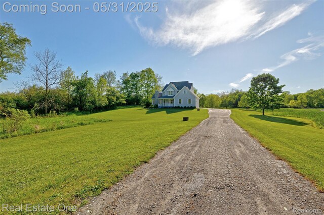 1572 S Hadley Rd, Ortonville, MI 48462 - view of dirt / gravel driveway