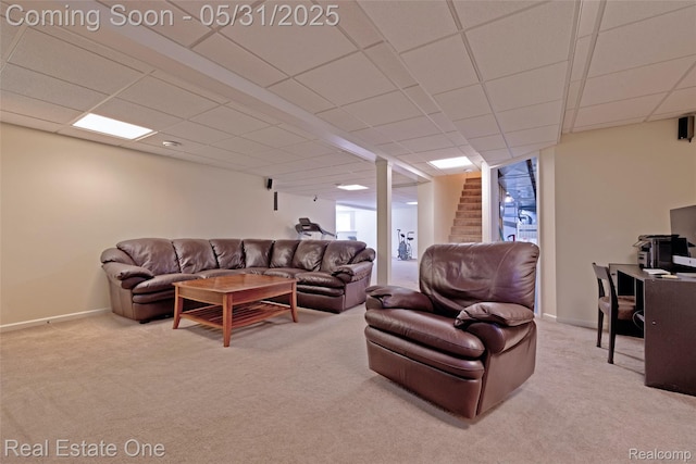1572 S Hadley Rd, Ortonville, MI 48462 - living area with carpet flooring, a drop ceiling, stairway, and baseboards