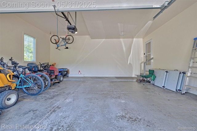 1572 S Hadley Rd, Ortonville, MI 48462 - garage with a garage door opener