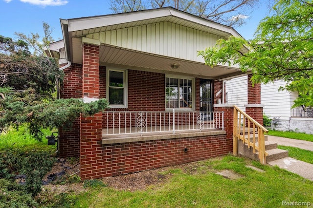 15730 Winthrop St, Detroit, MI 48227 - bungalow-style house with brick siding and a porch