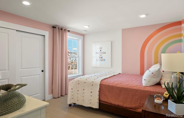 1777 Addison Cir, Walled Lake, MI 48390 - bedroom featuring light carpet, a closet, and recessed lighting