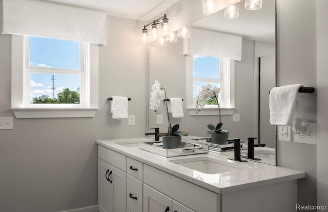 1777 Addison Cir, Walled Lake, MI 48390 - full bath with double vanity and baseboards