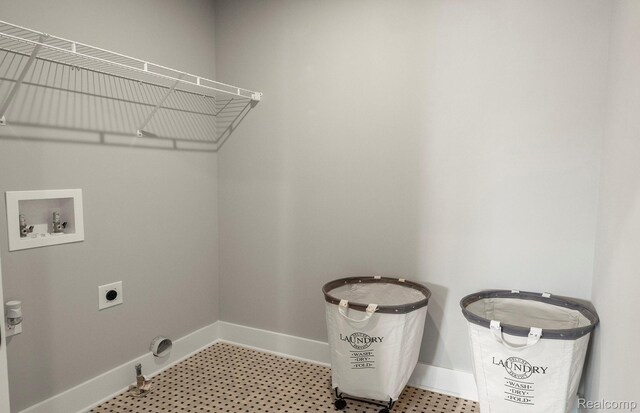 1777 Addison Cir, Walled Lake, MI 48390 - washroom featuring washer hookup, baseboards, and hookup for an electric dryer