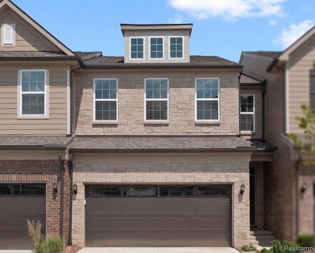 1777 Addison Cir, Walled Lake, MI 48390 - multi unit property with a garage, concrete driveway, and roof with shingles