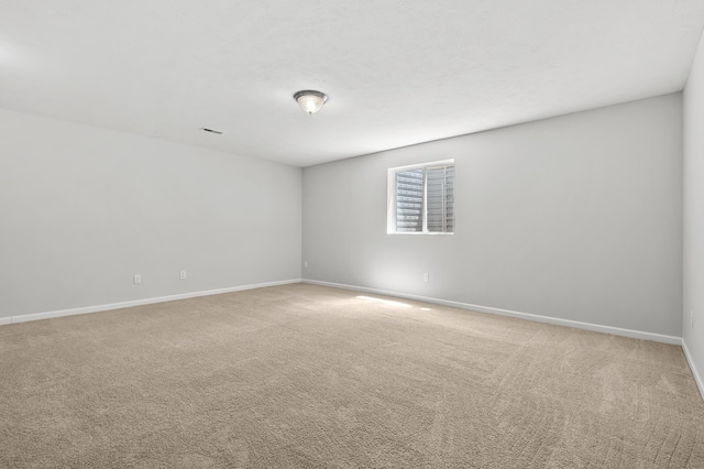 10126 Castle Creek Cir, Galesburg, MI 49053 - unfurnished room with baseboards and light carpet