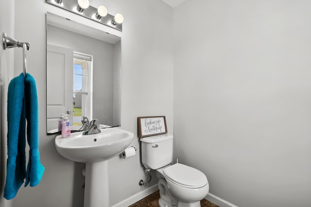 10126 Castle Creek Cir, Galesburg, MI 49053 - bathroom with toilet and baseboards