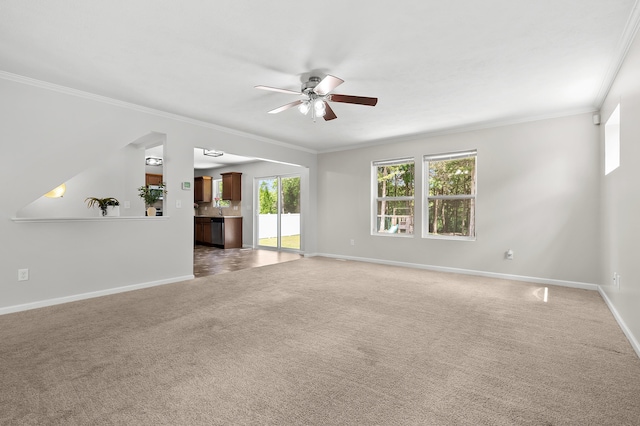 10126 Castle Creek Cir, Galesburg, MI 49053 - unfurnished living room with ceiling fan, crown molding, baseboards, and light carpet