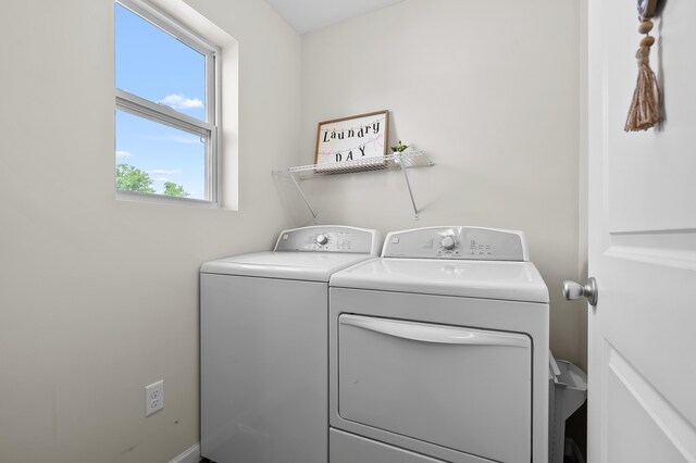 10126 Castle Creek Cir, Galesburg, MI 49053 - laundry room with washing machine and clothes dryer