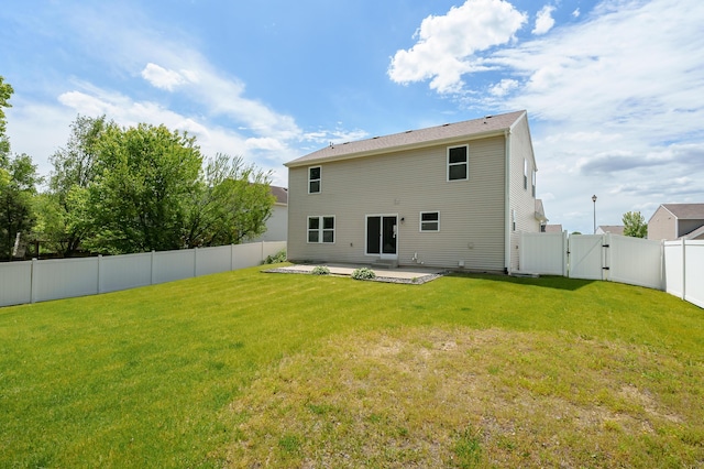 10126 Castle Creek Cir, Galesburg, MI 49053 - rear view of house featuring a patio and a gate