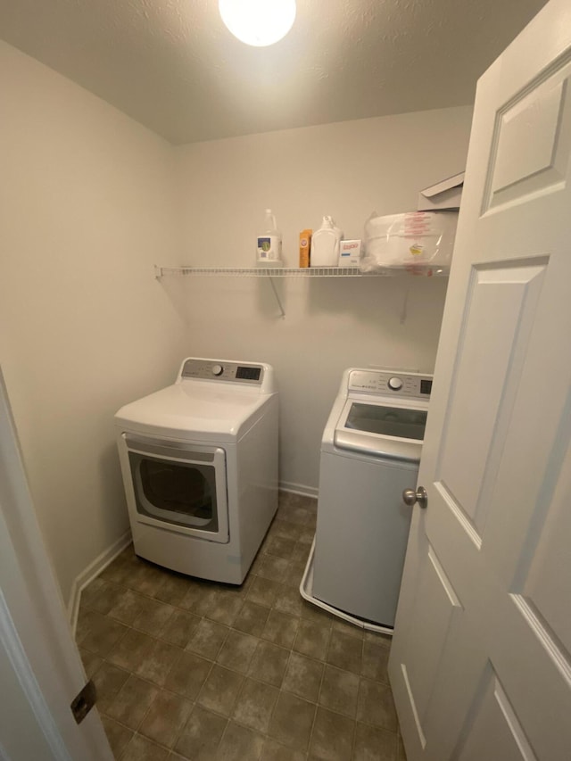 8287 Falkirk Dr, Indiana, IN 46123 - washroom featuring washing machine and clothes dryer and baseboards