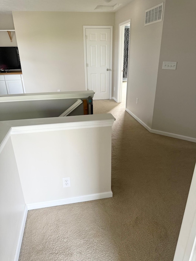8287 Falkirk Dr, Indiana, IN 46123 - corridor featuring carpet flooring, baseboards, and an upstairs landing