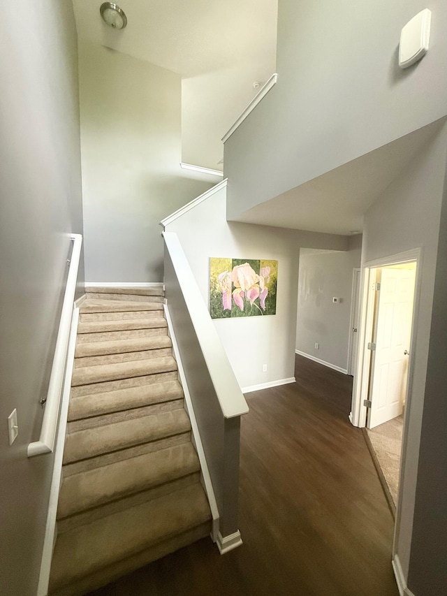 8287 Falkirk Dr, Indiana, IN 46123 - stairway featuring wood finished floors and baseboards