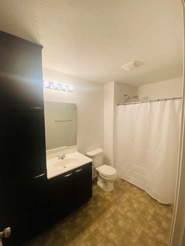 8287 Falkirk Dr, Indiana, IN 46123 - full bath with vanity, toilet, a textured ceiling, curtained shower, and tile patterned floors