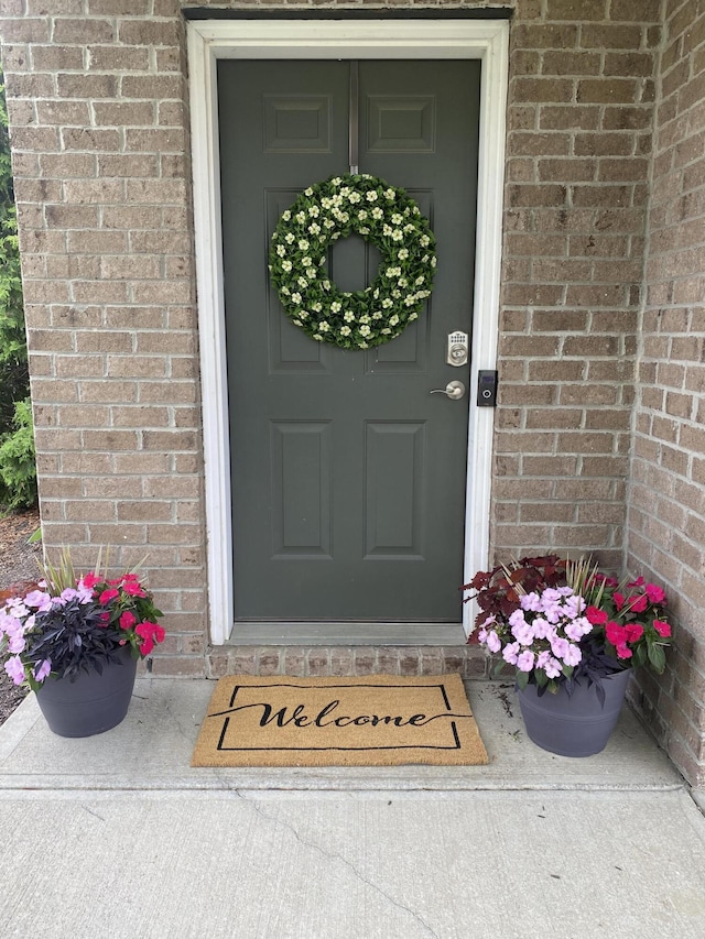 8287 Falkirk Dr, Indiana, IN 46123 - doorway to property featuring brick siding