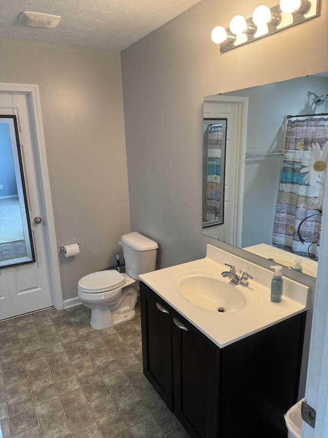 8287 Falkirk Dr, Indiana, IN 46123 - bathroom featuring vanity, toilet, a textured ceiling, and a shower with curtain