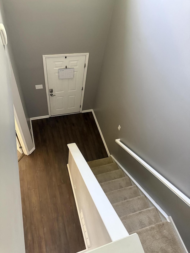 8287 Falkirk Dr, Indiana, IN 46123 - stairway with wood finished floors and baseboards