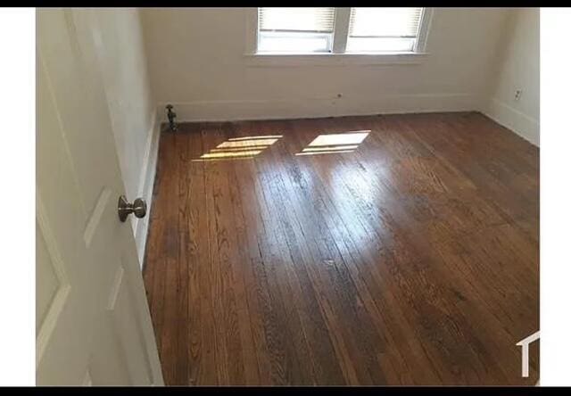 9363 Marlowe, Detroit, MI 48228 - empty room with baseboards and wood finished floors