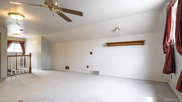 3446 17th St, Wyandotte, MI 48192 - bonus room with a ceiling fan, light carpet, and baseboards