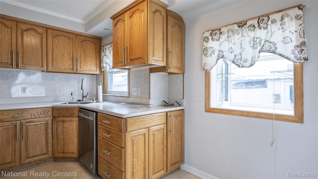 3446 17th St, Wyandotte, MI 48192 - kitchen featuring a sink, stainless steel dishwasher, brown cabinetry, light countertops, and crown molding