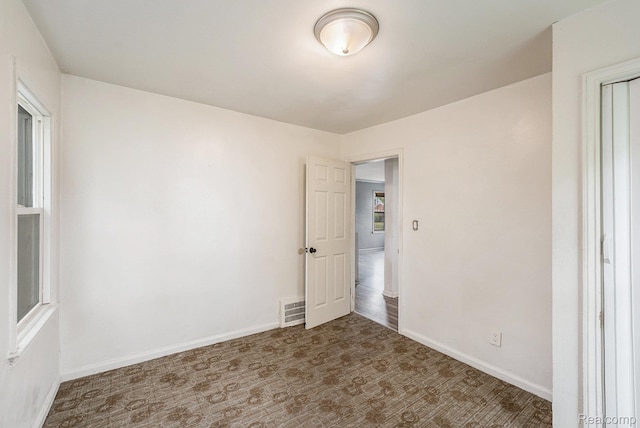 15500 Strathmoor St, Detroit, MI 48227 - unfurnished room featuring baseboards and carpet flooring