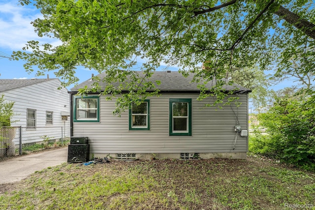 15500 Strathmoor St, Detroit, MI 48227 - rear view of property with a shingled roof