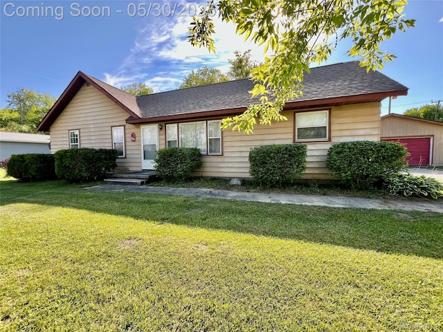 1865 Range Rd, Kimball, MI 48074 - single story home with a shingled roof and a front yard