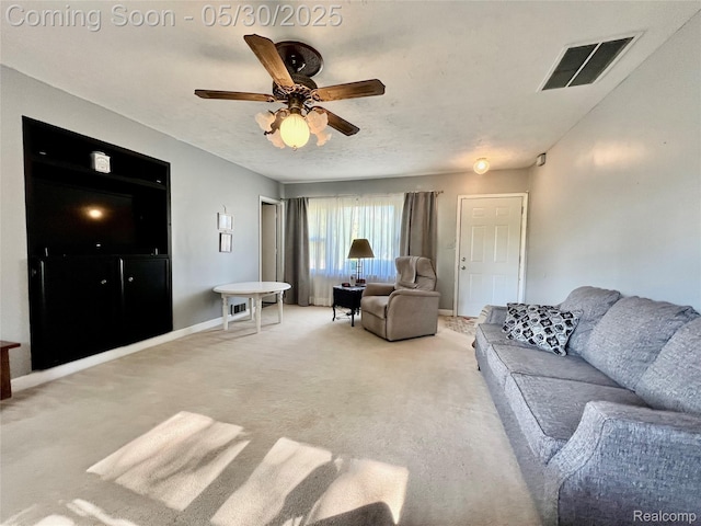 1865 Range Rd, Kimball, MI 48074 - living room featuring carpet, a ceiling fan, and baseboards