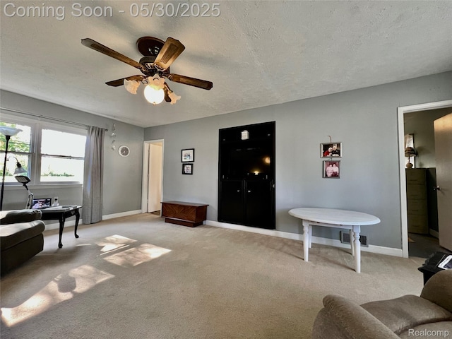 1865 Range Rd, Kimball, MI 48074 - living area with ceiling fan, light colored carpet, baseboards, and a textured ceiling