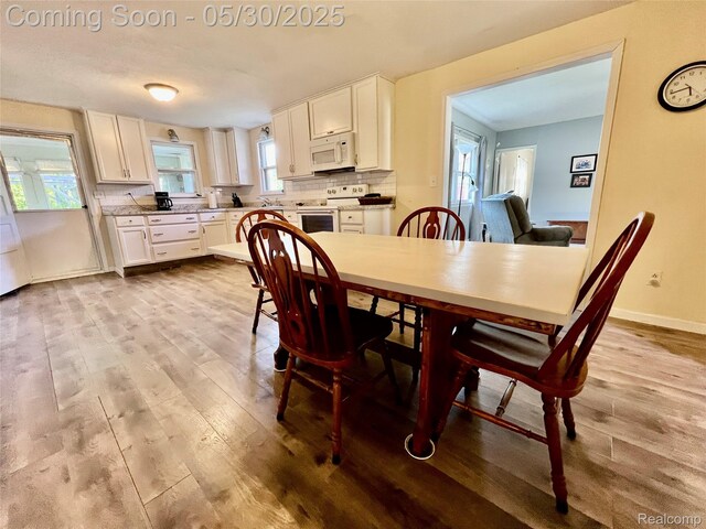 1865 Range Rd, Kimball, MI 48074 - dining area featuring wood finished floors and baseboards