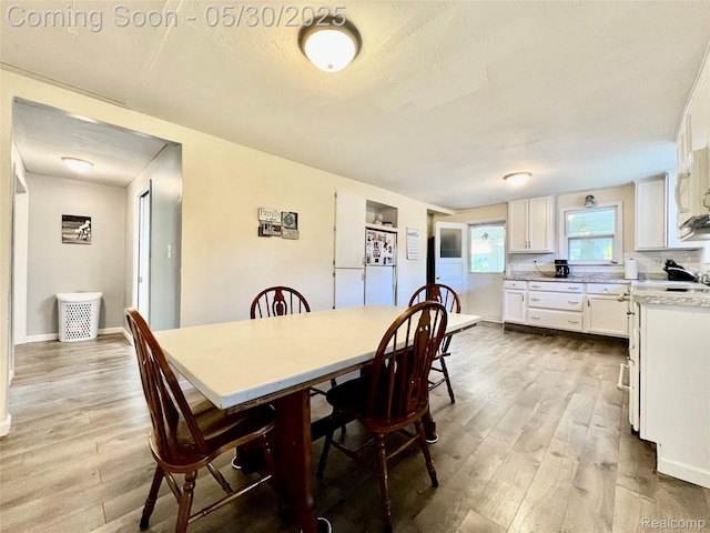 1865 Range Rd, Kimball, MI 48074 - dining room featuring wood finished floors and baseboards