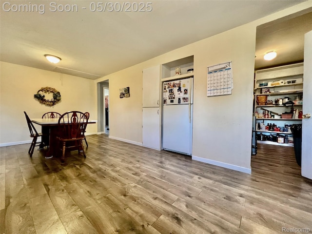 1865 Range Rd, Kimball, MI 48074 - dining room featuring wood finished floors and baseboards