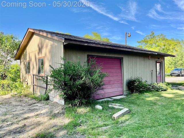 1865 Range Rd, Kimball, MI 48074 - view of outbuilding with a garage