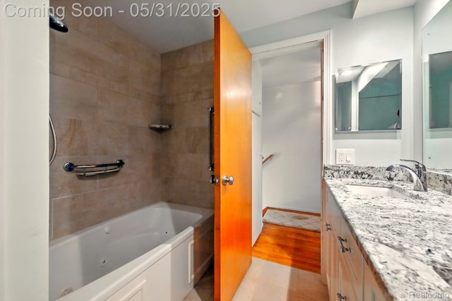 14846 Lakewood Dr, Plymouth, MI 48170 - full bathroom featuring vanity, tile patterned floors, and a combined bath / shower with jetted tub