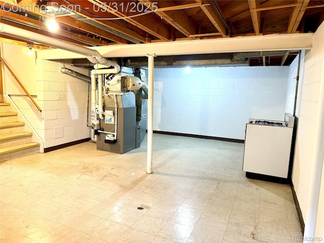 14846 Lakewood Dr, Plymouth, MI 48170 - below grade area featuring tile patterned floors, stairway, and heating unit