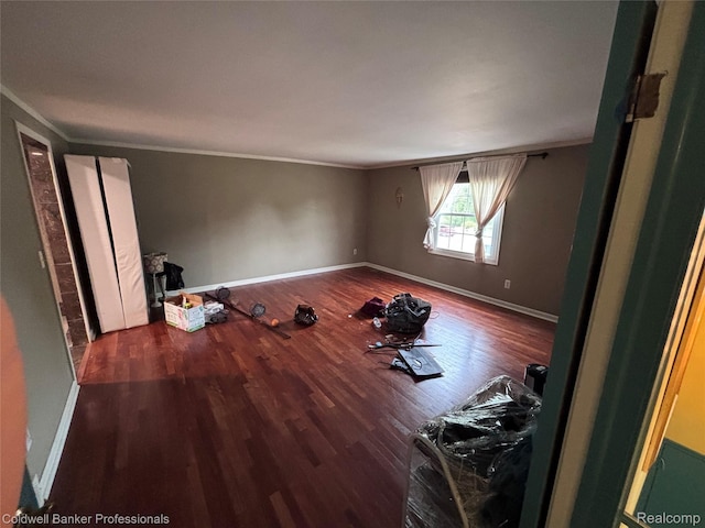 5550 25 Mile Rd, Shelby Twp, MI 48316 - spare room featuring ornamental molding, wood finished floors, and baseboards