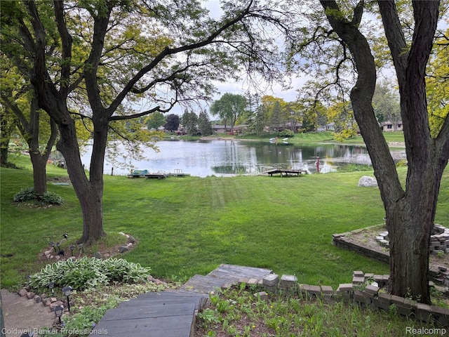 5550 25 Mile Rd, Shelby Twp, MI 48316 - view of green lawn with a water view