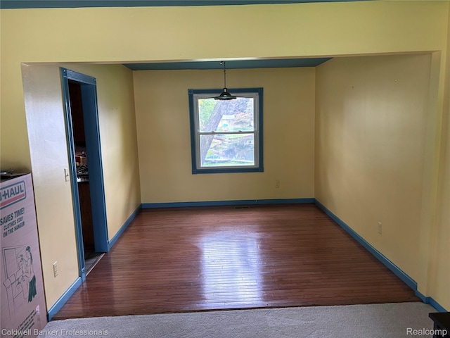 5550 25 Mile Rd, Shelby Twp, MI 48316 - unfurnished room with wood-type flooring and baseboards