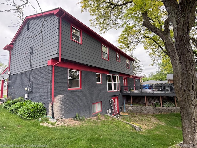 5550 25 Mile Rd, Shelby Twp, MI 48316 - back of property featuring a lawn, a wooden deck, and brick siding