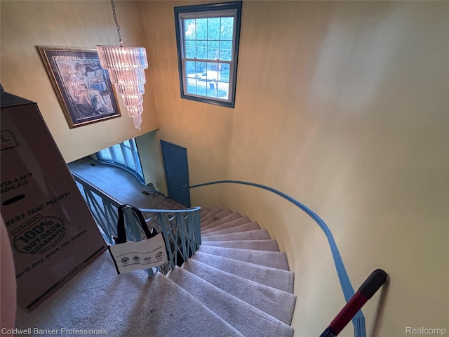 5550 25 Mile Rd, Shelby Twp, MI 48316 - stairs featuring a chandelier and carpet flooring