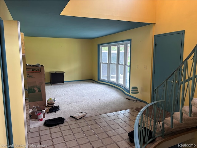5550 25 Mile Rd, Shelby Twp, MI 48316 - tiled foyer with carpet floors, baseboards, and stairs