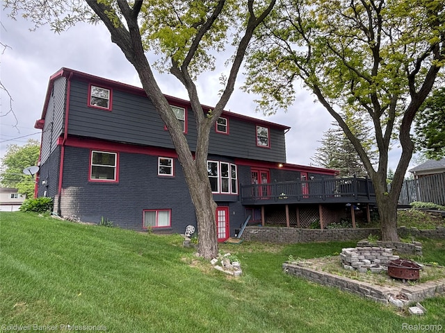 5550 25 Mile Rd, Shelby Twp, MI 48316 - back of house with an outdoor fire pit, a deck, a lawn, and brick siding