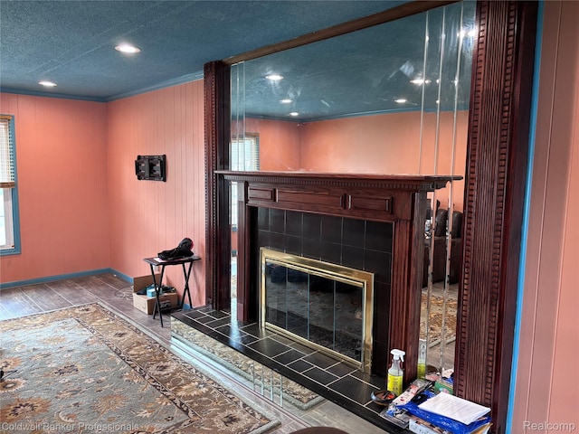 5550 25 Mile Rd, Shelby Twp, MI 48316 - detailed view of a fireplace, ornamental molding, baseboards, wood finished floors, and recessed lighting