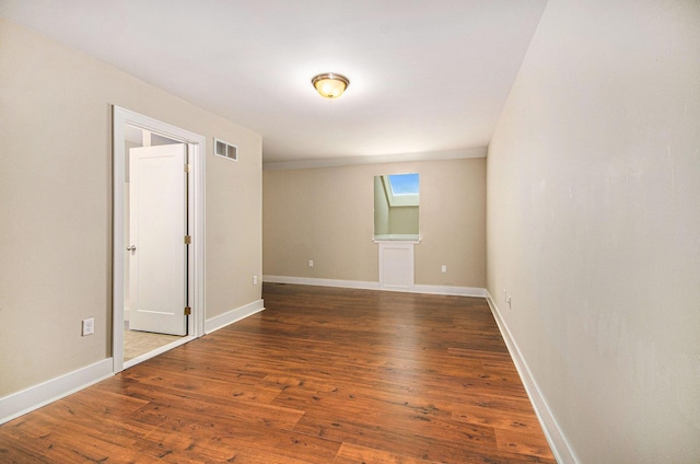 2512 W Liberty St, Ann Arbor, MI 48103 - unfurnished room featuring wood finished floors and baseboards