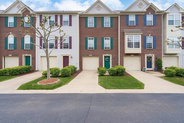 36438 Dominion Cir, Sterling Heights, MI 48310 - view of property featuring a garage, driveway, and brick siding