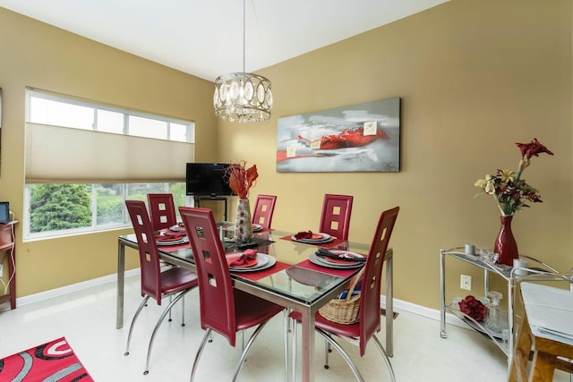 36438 Dominion Cir, Sterling Heights, MI 48310 - dining room featuring a chandelier and baseboards