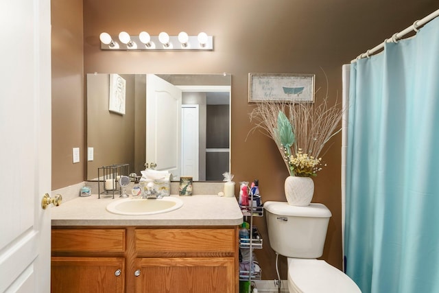 36438 Dominion Cir, Sterling Heights, MI 48310 - bathroom featuring vanity, toilet, and a shower with shower curtain