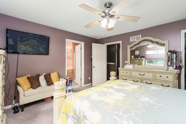 36438 Dominion Cir, Sterling Heights, MI 48310 - bedroom featuring carpet, baseboards, connected bathroom, and a ceiling fan